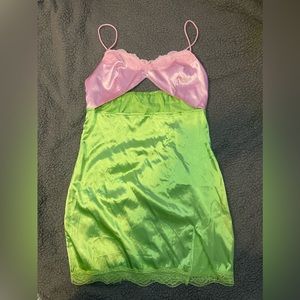 Pink and green slip dress with lace hem
